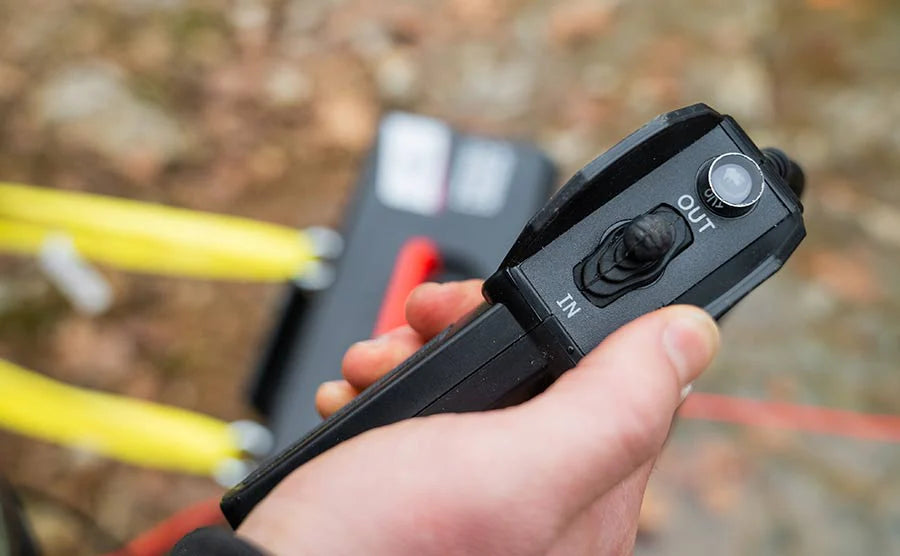 Trojan Portable Utility 12v (1814kg) Winch with Synthetic Rope remote switch close up