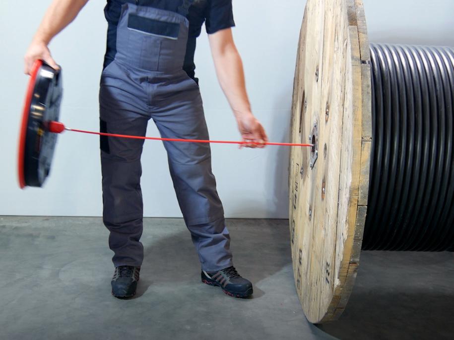 RUNPOTEC Red Runposticks cable laying tools in use 