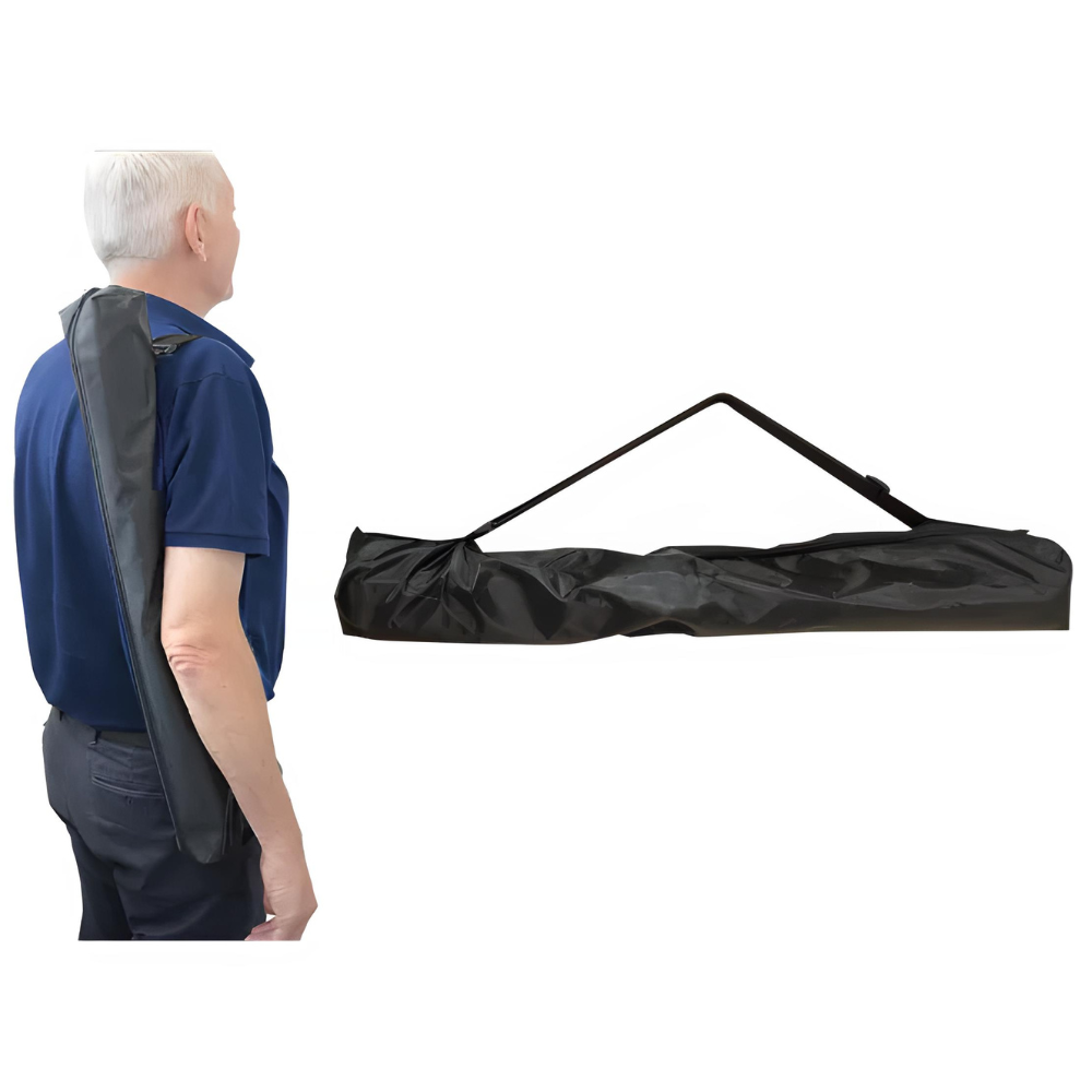 Man wearing a long black and gray strap over his shoulder with a folded black carrying bag on a white background.