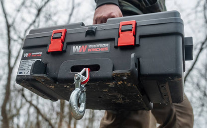 Trojan Portable Utility 12v (1814kg) Winch with Synthetic Rope beong carried 